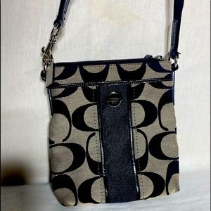 Cloth Coach cross body. No stains,rips,tears like new.